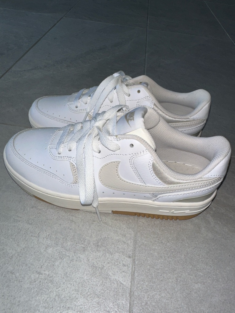 Nike White Sneakers with Cream Swoosh and Gum Outsole